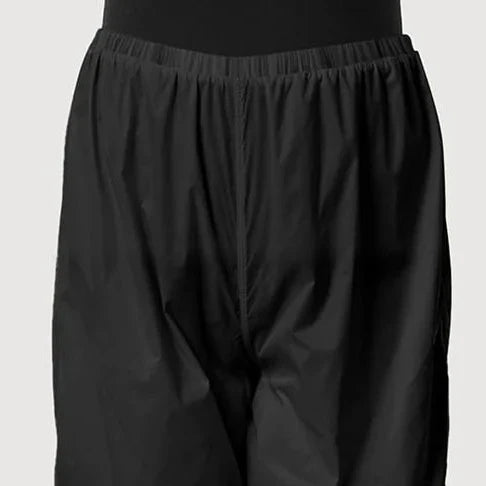Dancer wearing the Bloch Ripstop Ballet Warmup Shorts, colour black. Shorts feature an elastic waistband and baggy leg fit and design | Dancewear Nation Australia. 