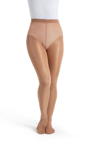 Ultra shimmery footed tights worn by a person with a white top