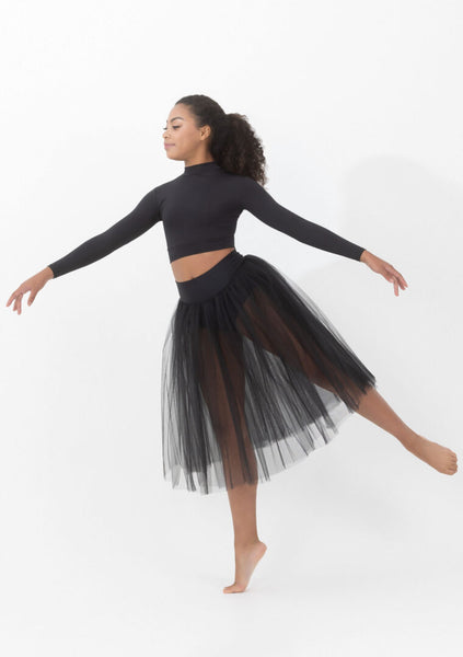 Dancer wearing a black long-sleeve top and tulle skirt on a white background