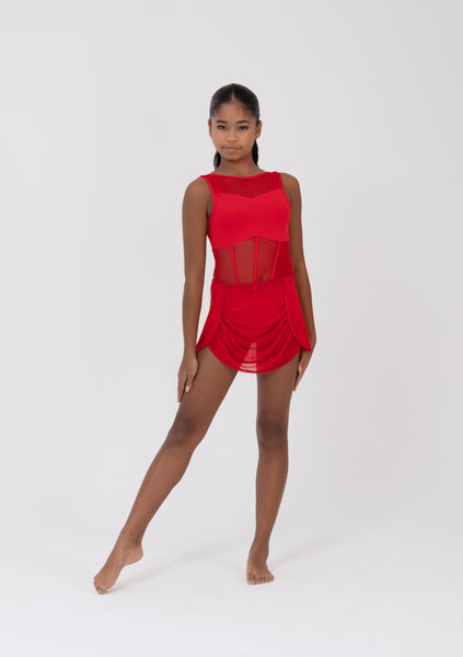 Dancer in a Red leotard and skirt on a white background