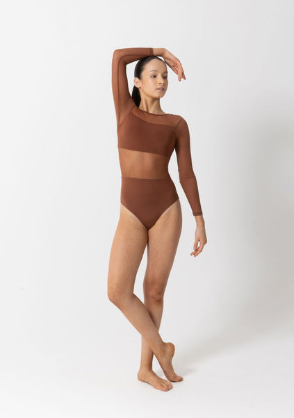 Person wearing a brown leotard on a white background