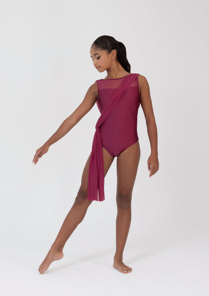 Dancer wearing a Crimson leotard with a draped design on a white background
