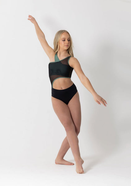 woman wearing green crop top with sheet black leotard over the top on a white background