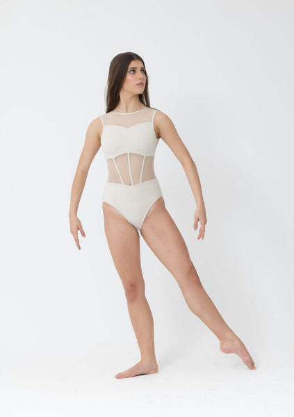 Woman wearing a white bodysuit with mesh panels on a white background