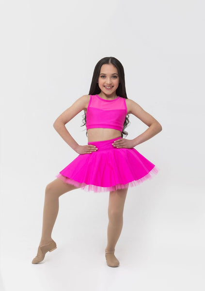 A young female in a hot pink skater skirt with a nylon waistband, paired with a matching crop top.