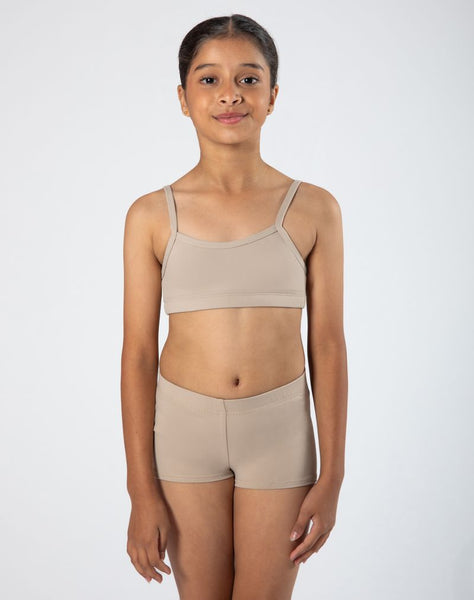 Person wearing a beige sports bra and shorts set on a white background