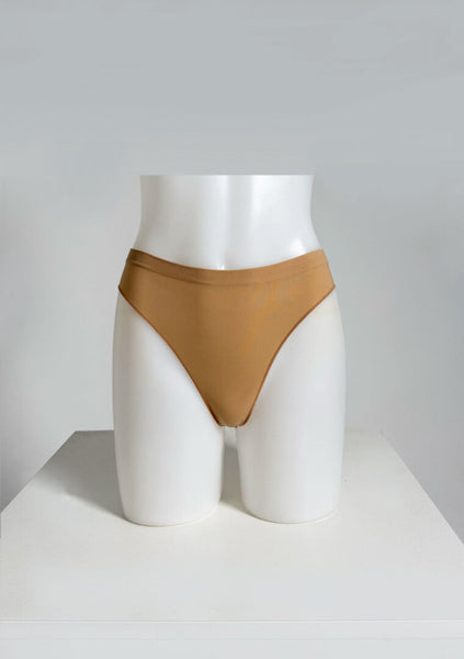 Nude G string brief on white maniquin 