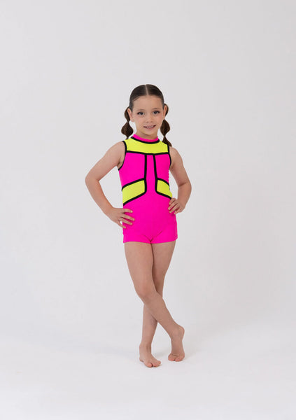 Young girl wearing a pink and yellow leotard on a white background