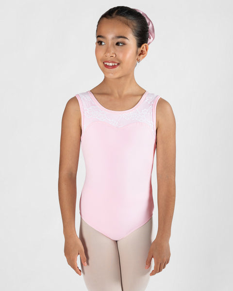 Dancer wearing Candy coloured leotard with white lace detailing on the shoulder and across chest on a light gray background