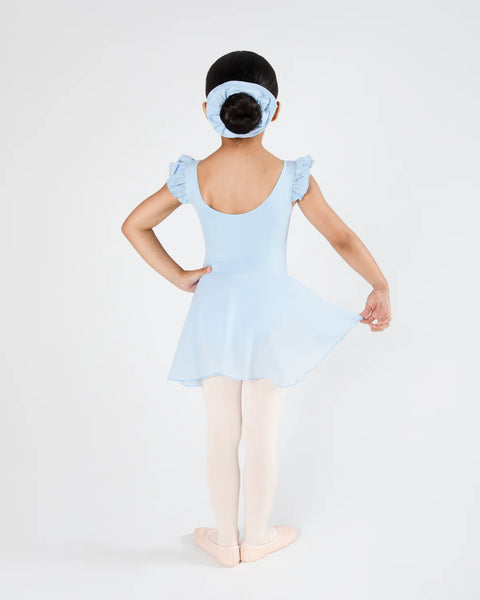 Young girl in a baby blue Leotard and Skirt posing on a white background