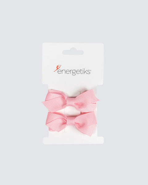 Pink hair bows with 'energetiks' branding on a white background