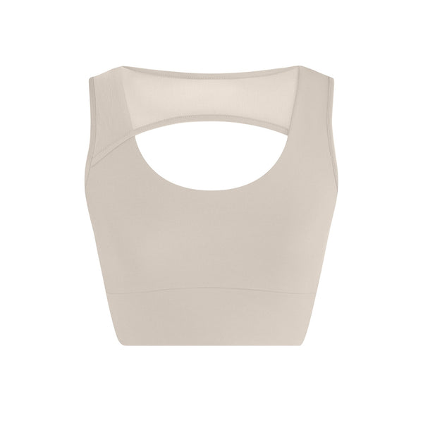 Beige dance crop top with a mesh design on a white background | Dancewear Nation Australia