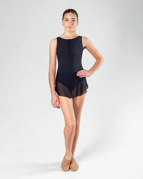 Person wearing a black leotard with a sheer ballet skirt over the top on a white background